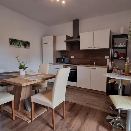 Апартаменты Family & In Village Center *